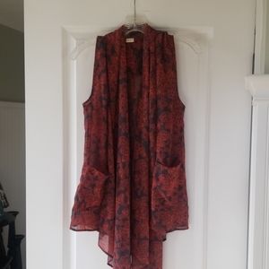 Sleeveless sheer vest with pockets